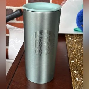 Starbucks to go cup approximately 6 inches tall  very good condition